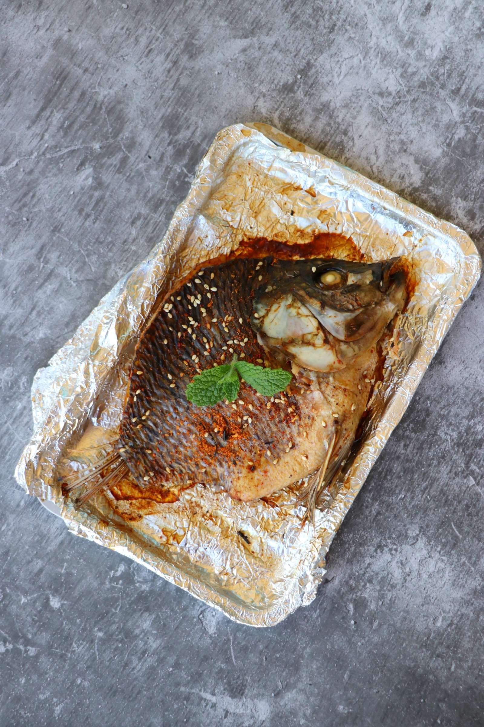 香烤羅非魚的做法-香辣味烤菜譜-易網健康養生網 香烤羅非魚的做法-香辣味烤菜譜